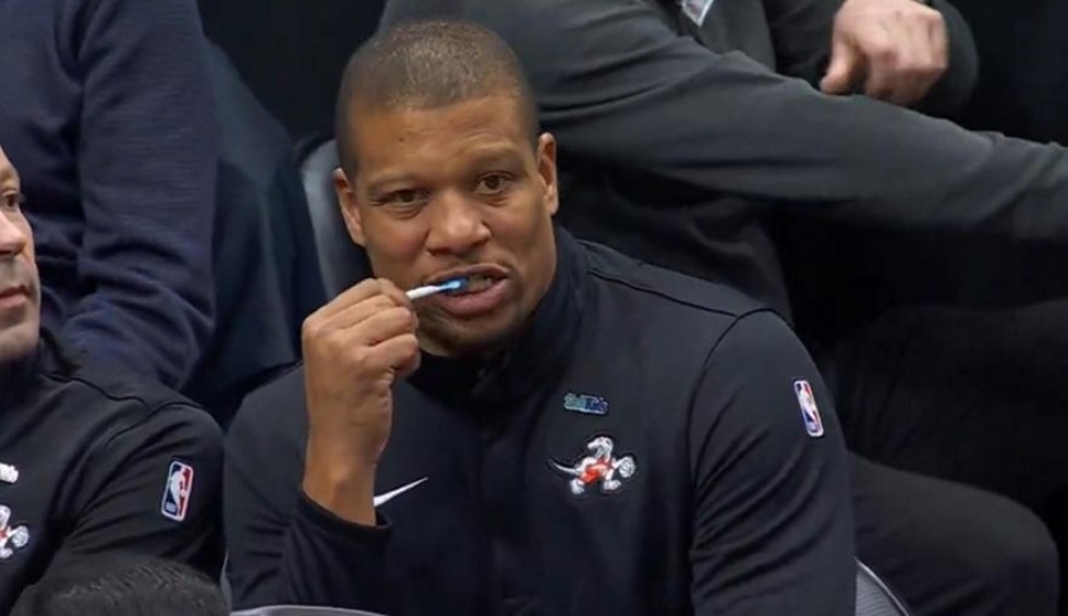 A generic square placeholder image with rounded corners in a figure.