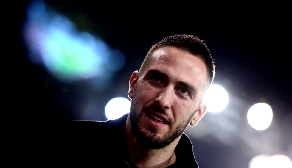 A generic square placeholder image with rounded corners in a figure.