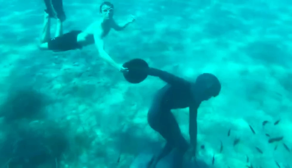 A generic square placeholder image with rounded corners in a figure.