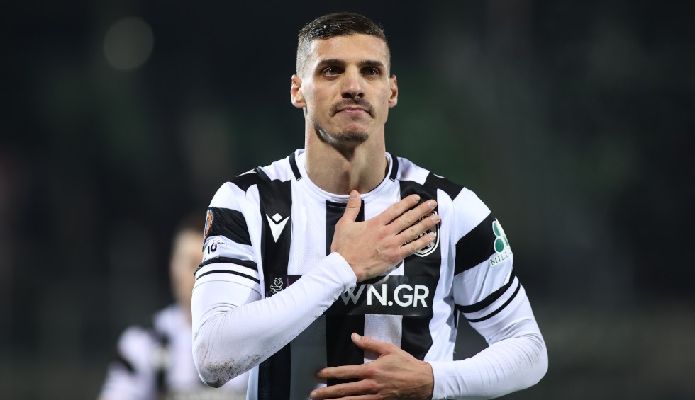 A generic square placeholder image with rounded corners in a figure.