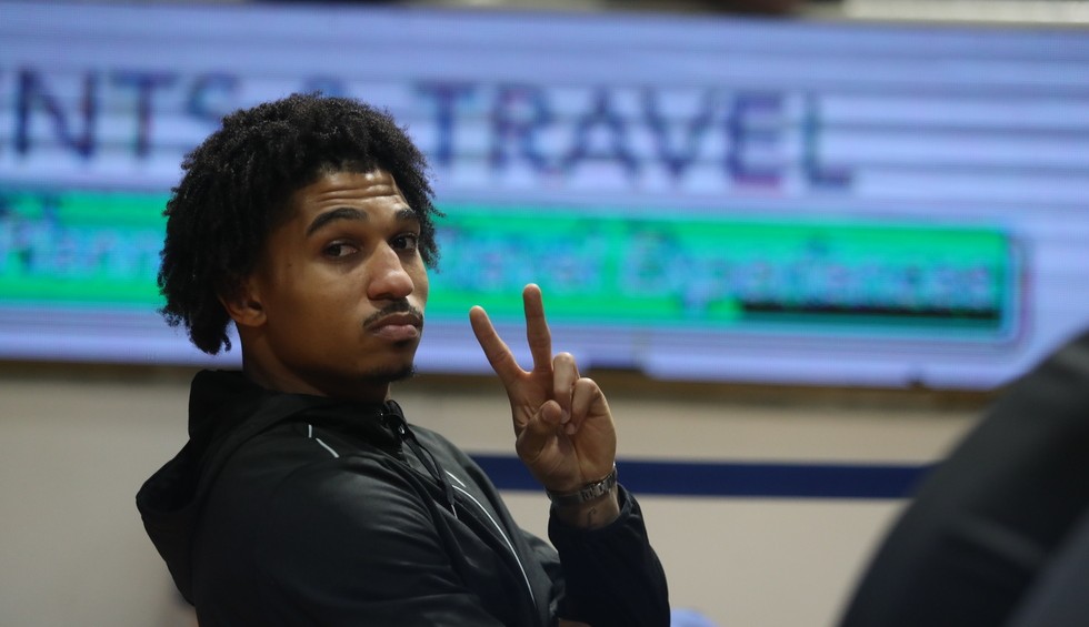 A generic square placeholder image with rounded corners in a figure.