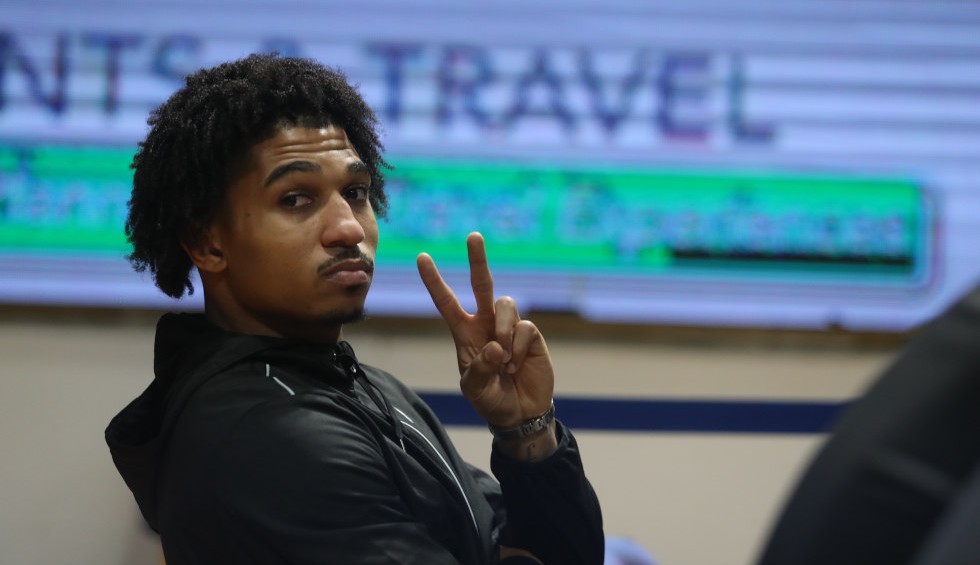 A generic square placeholder image with rounded corners in a figure.