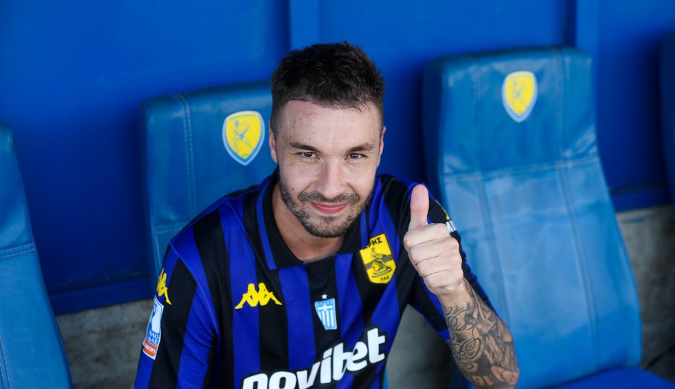 A generic square placeholder image with rounded corners in a figure.