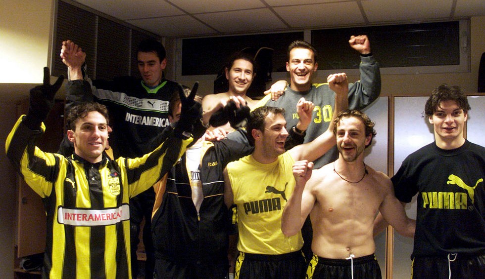 A generic square placeholder image with rounded corners in a figure.