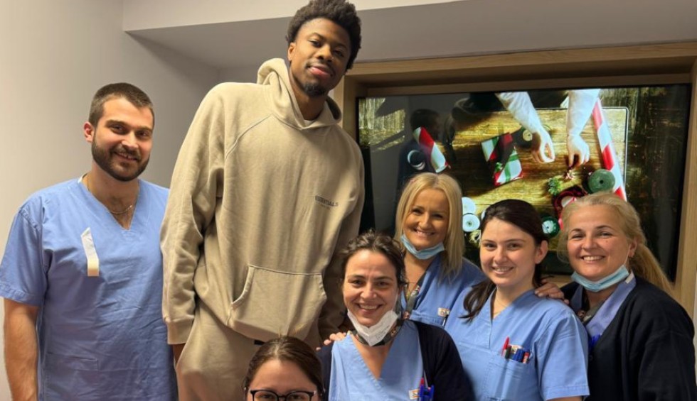 A generic square placeholder image with rounded corners in a figure.