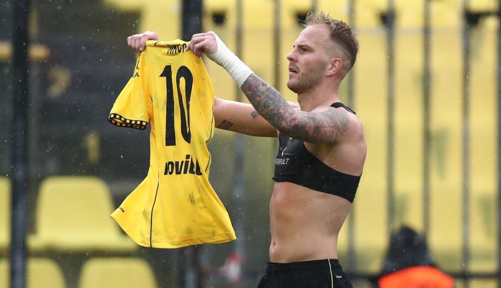 A generic square placeholder image with rounded corners in a figure.