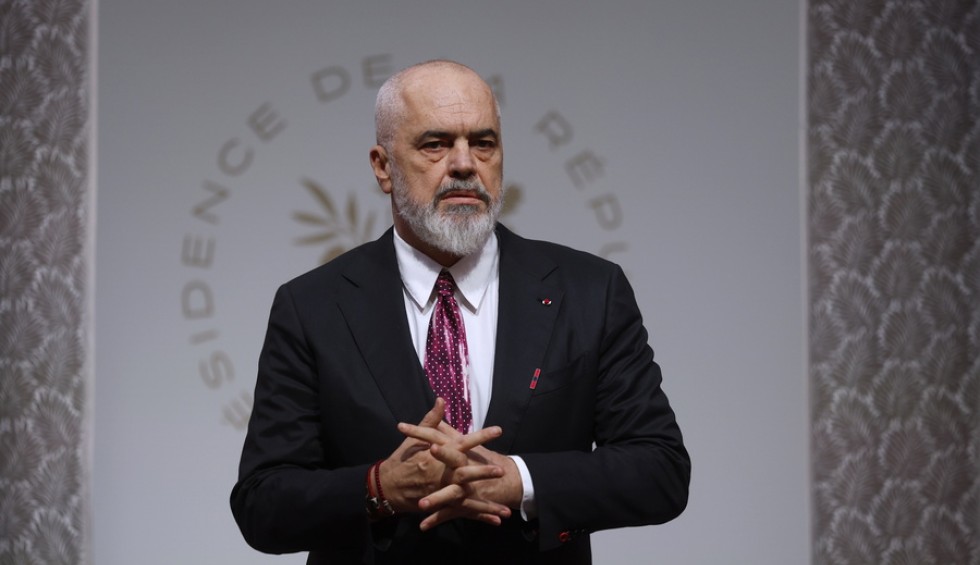 A generic square placeholder image with rounded corners in a figure.