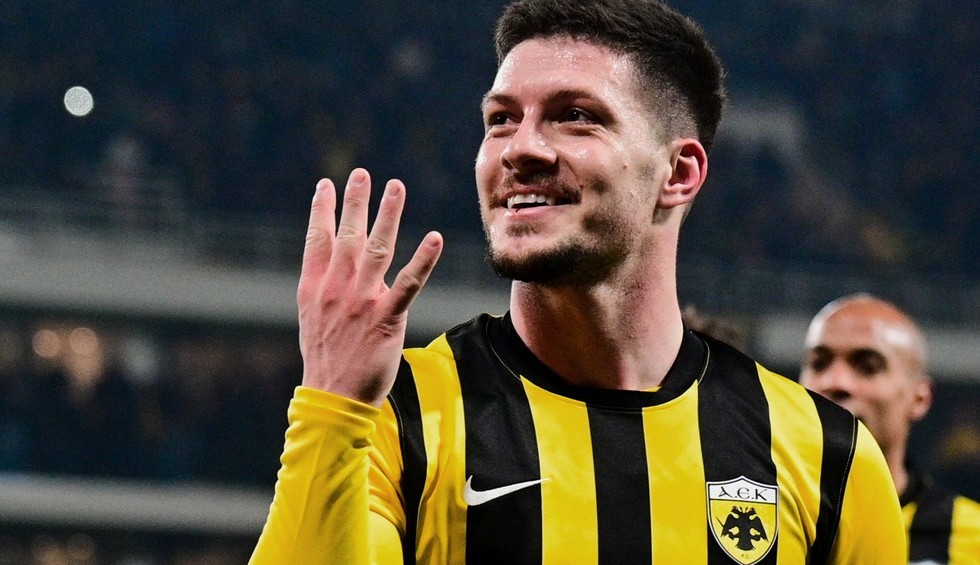 A generic square placeholder image with rounded corners in a figure.