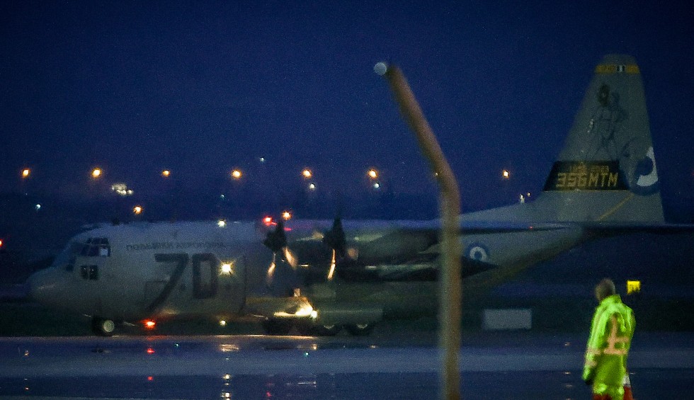 A generic square placeholder image with rounded corners in a figure.