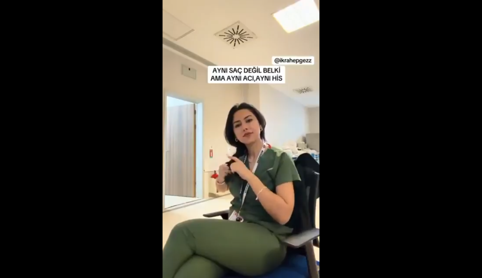 A generic square placeholder image with rounded corners in a figure.