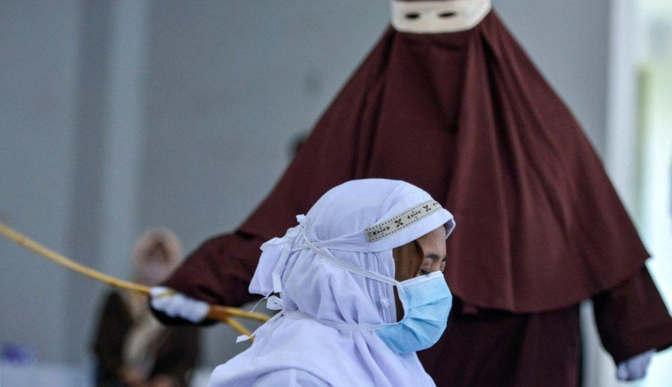 A generic square placeholder image with rounded corners in a figure.