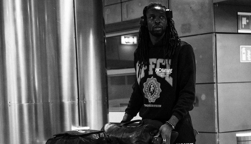 A generic square placeholder image with rounded corners in a figure.