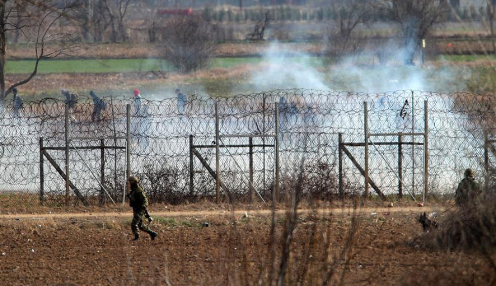 A generic square placeholder image with rounded corners in a figure.