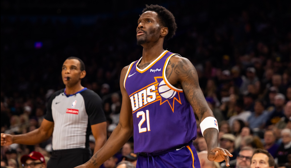 A generic square placeholder image with rounded corners in a figure.