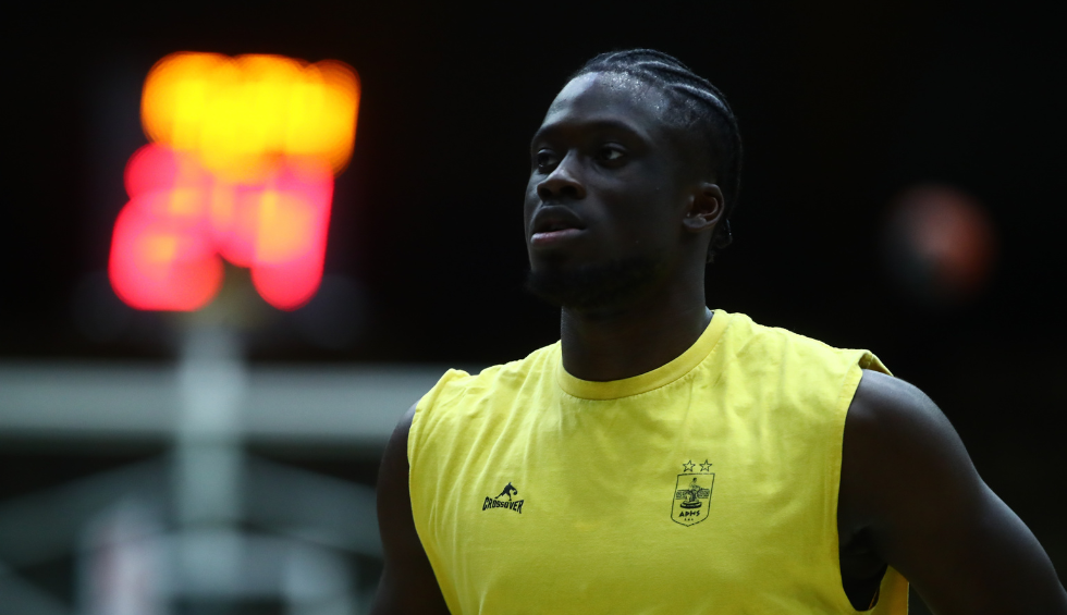 A generic square placeholder image with rounded corners in a figure.