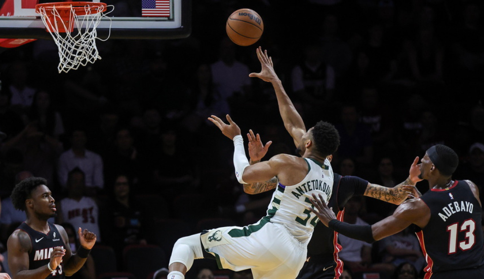 A generic square placeholder image with rounded corners in a figure.