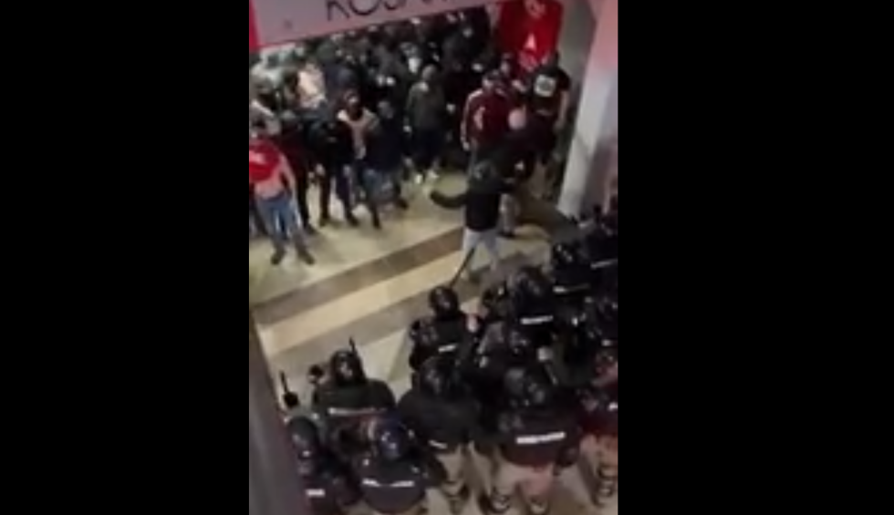 A generic square placeholder image with rounded corners in a figure.