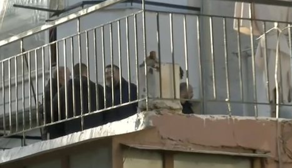 A generic square placeholder image with rounded corners in a figure.