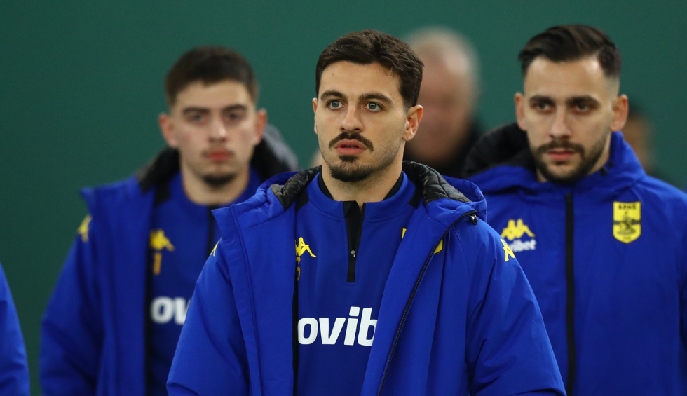 A generic square placeholder image with rounded corners in a figure.