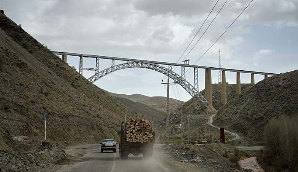 A generic square placeholder image with rounded corners in a figure.