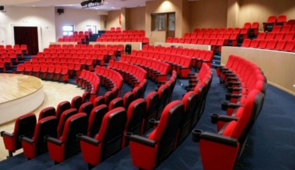 A generic square placeholder image with rounded corners in a figure.