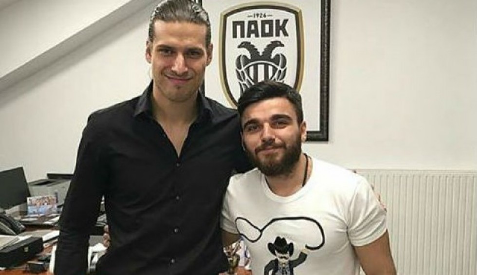 A generic square placeholder image with rounded corners in a figure.