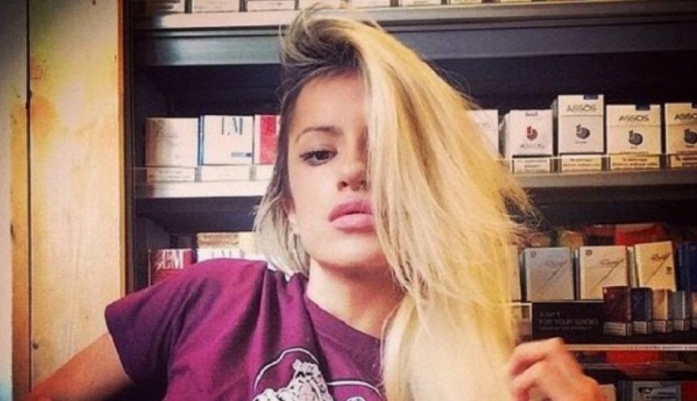 A generic square placeholder image with rounded corners in a figure.