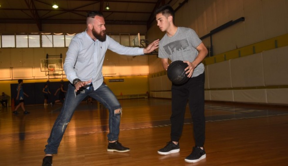 A generic square placeholder image with rounded corners in a figure.