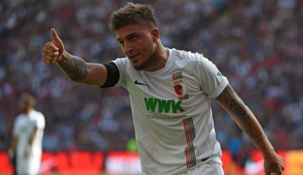 A generic square placeholder image with rounded corners in a figure.