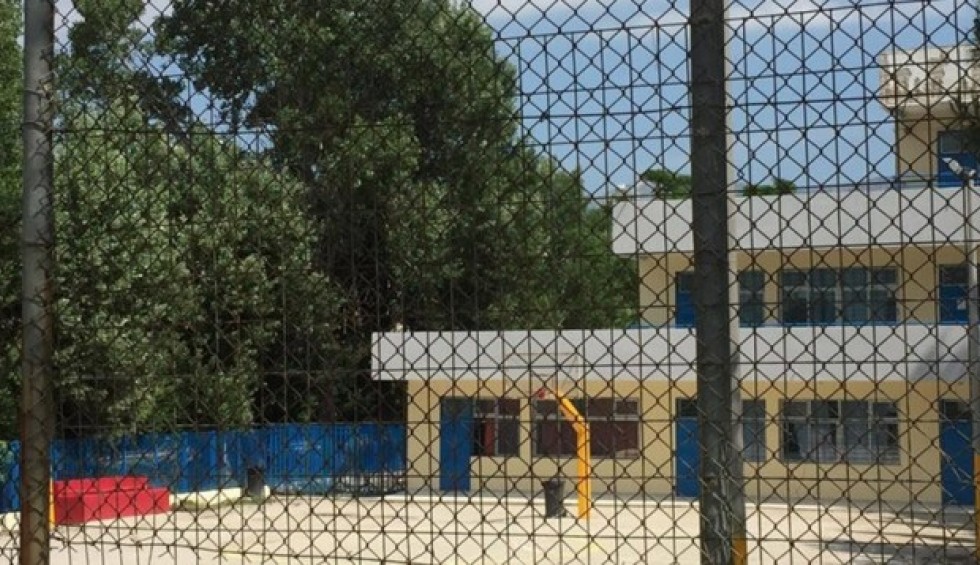 A generic square placeholder image with rounded corners in a figure.