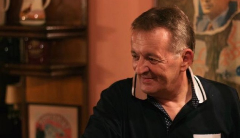 A generic square placeholder image with rounded corners in a figure.