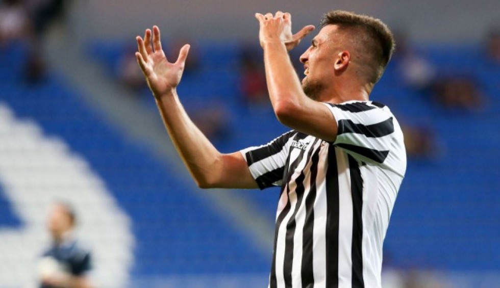 A generic square placeholder image with rounded corners in a figure.