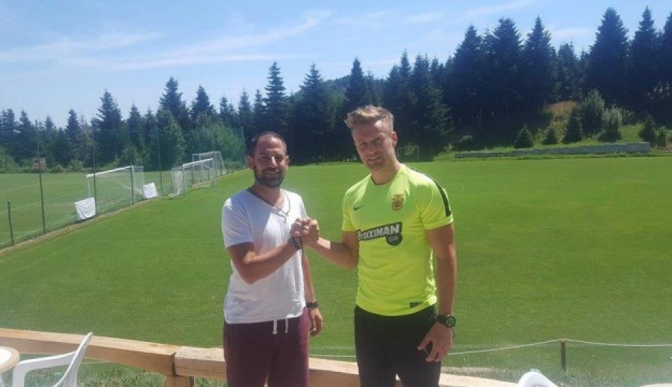 A generic square placeholder image with rounded corners in a figure.