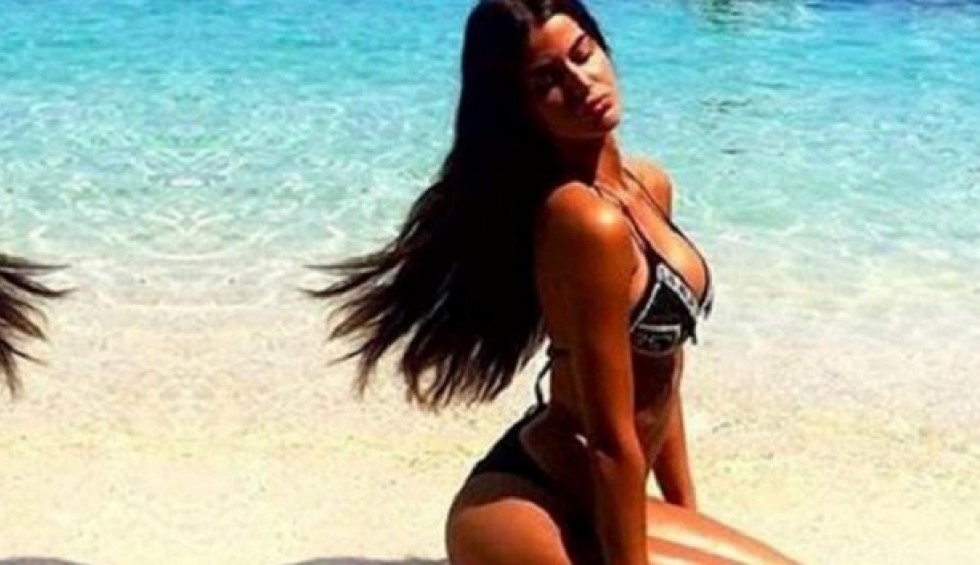 A generic square placeholder image with rounded corners in a figure.