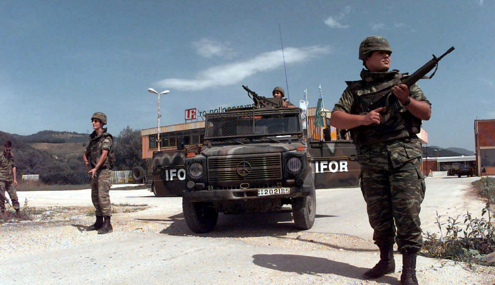 A generic square placeholder image with rounded corners in a figure.