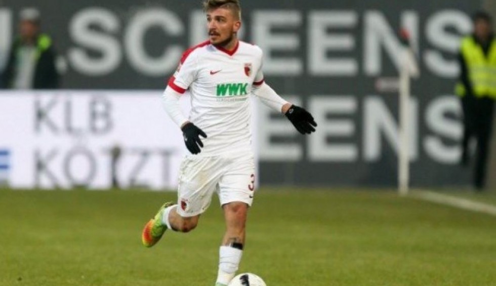 A generic square placeholder image with rounded corners in a figure.