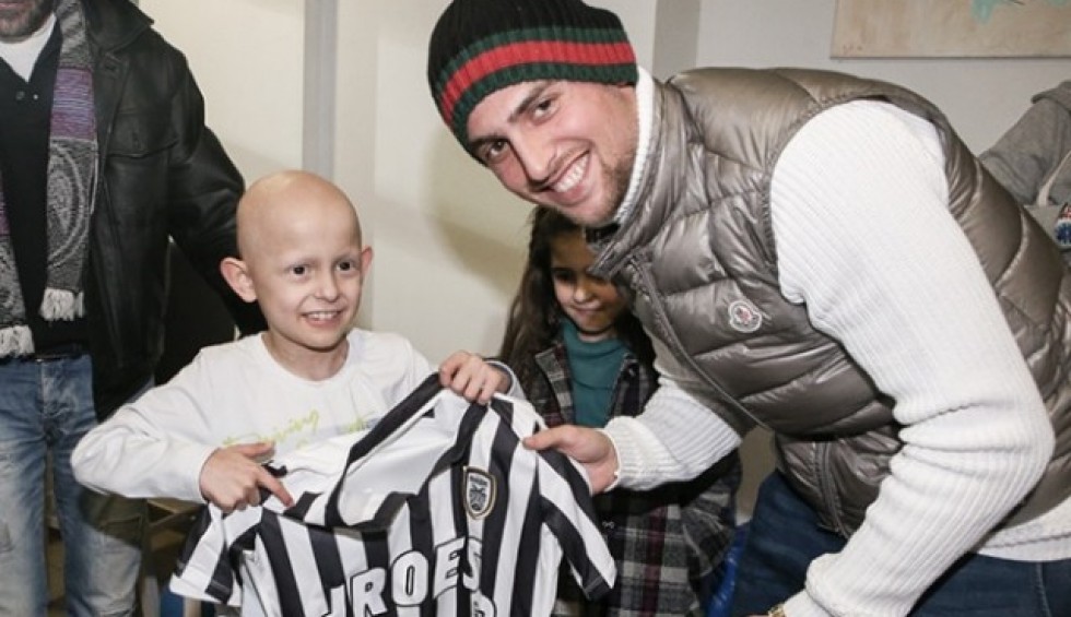 A generic square placeholder image with rounded corners in a figure.