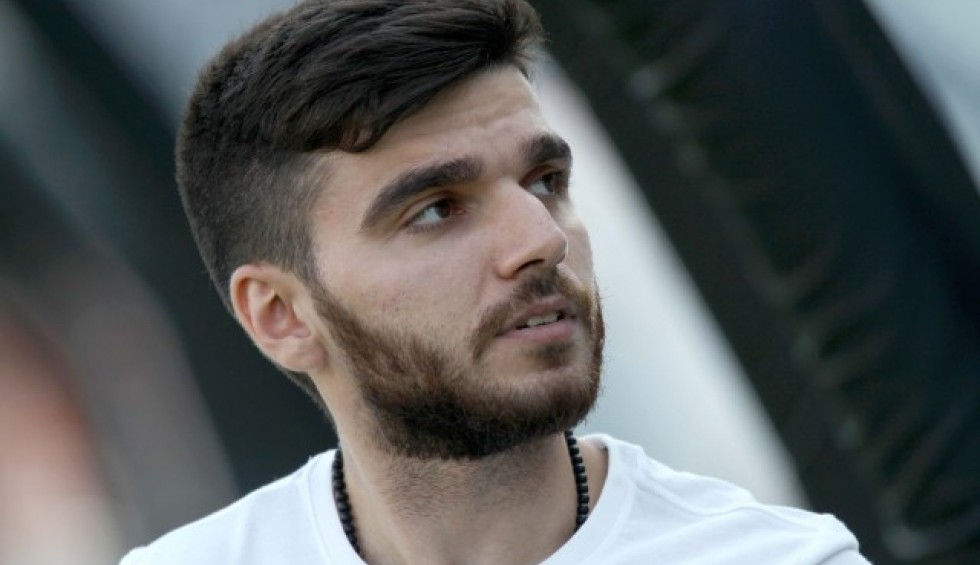 A generic square placeholder image with rounded corners in a figure.