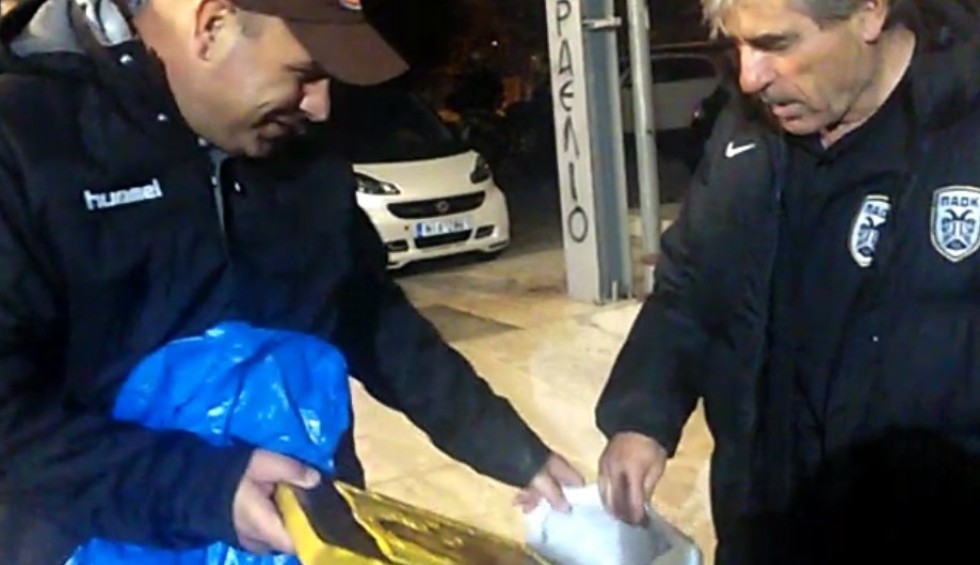 A generic square placeholder image with rounded corners in a figure.