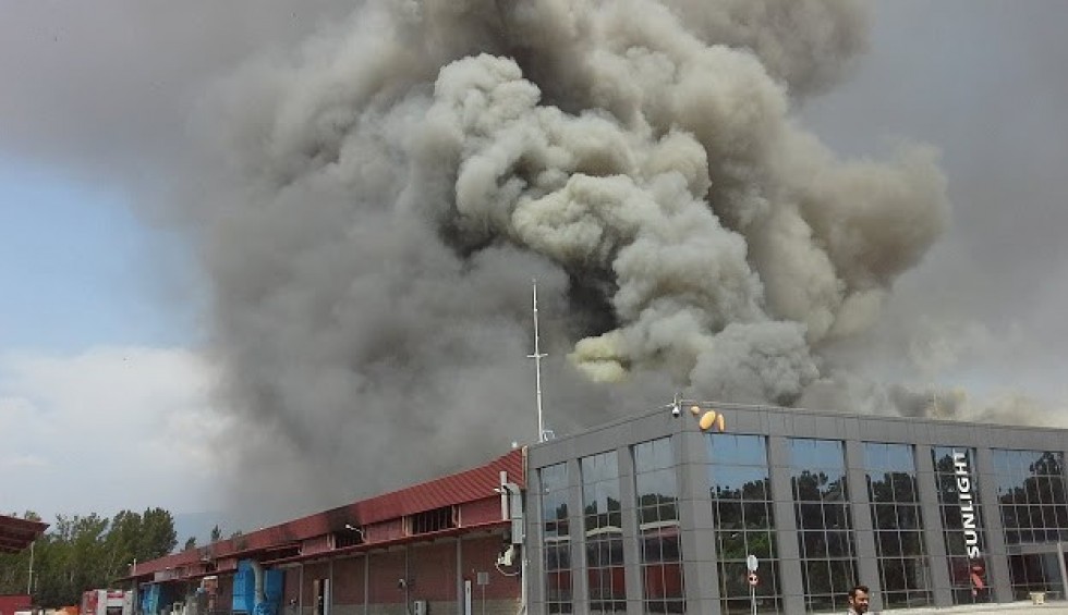 A generic square placeholder image with rounded corners in a figure.