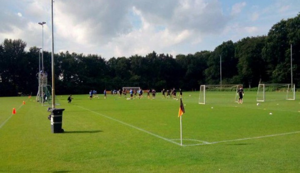 A generic square placeholder image with rounded corners in a figure.