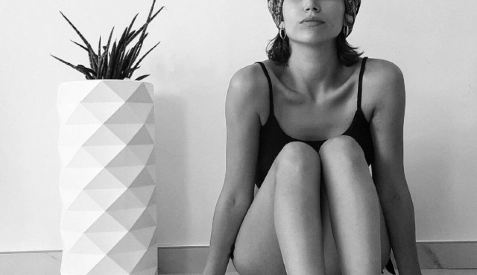 A generic square placeholder image with rounded corners in a figure.