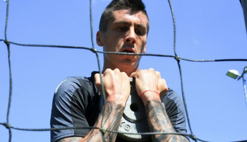 A generic square placeholder image with rounded corners in a figure.