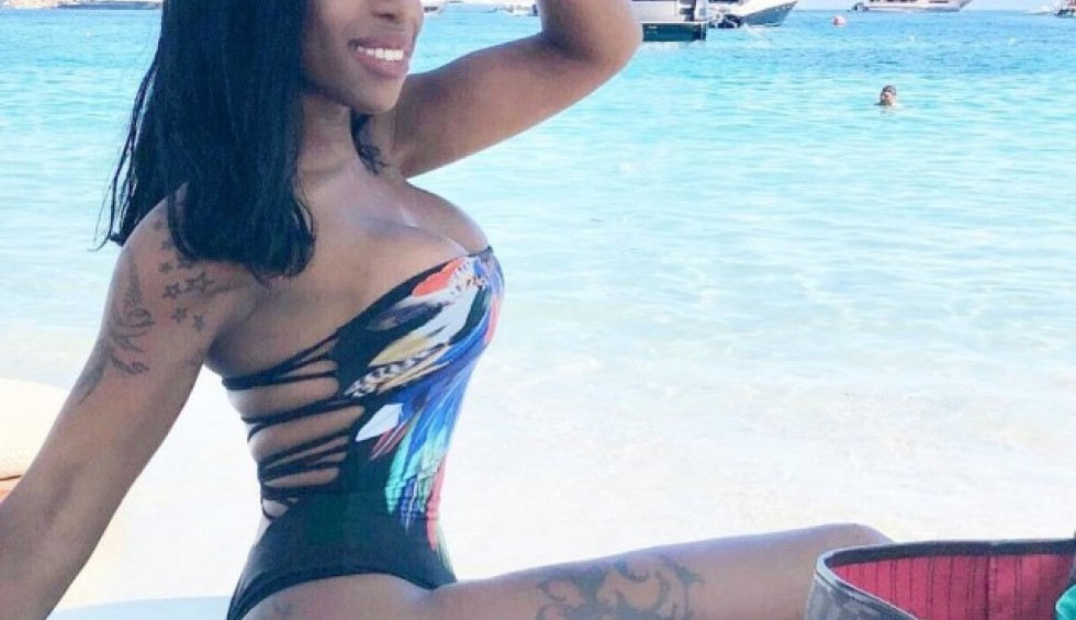 A generic square placeholder image with rounded corners in a figure.