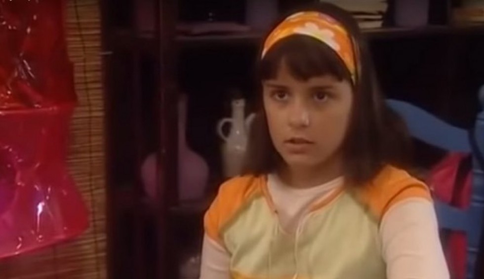 A generic square placeholder image with rounded corners in a figure.