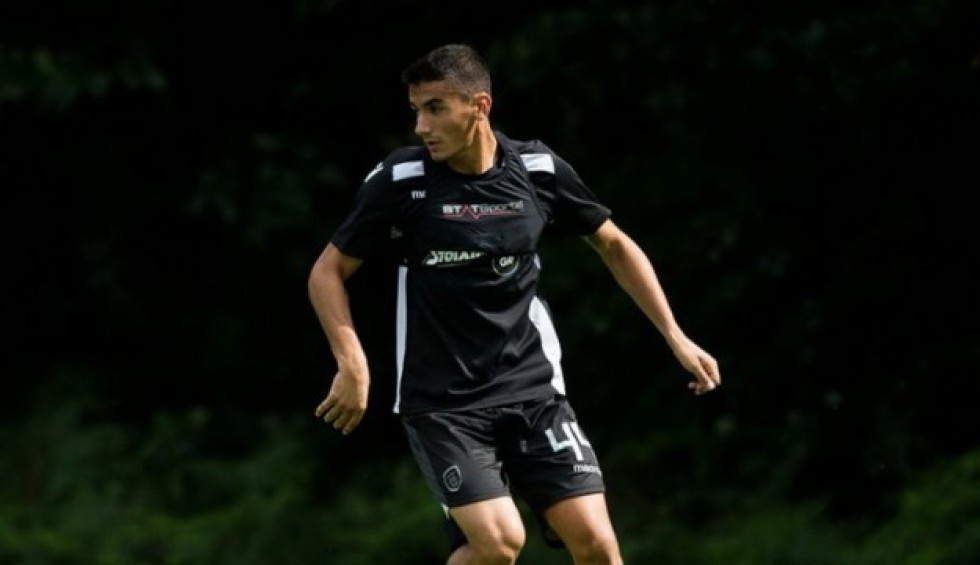 A generic square placeholder image with rounded corners in a figure.