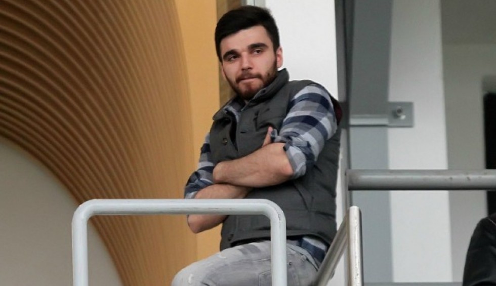 A generic square placeholder image with rounded corners in a figure.