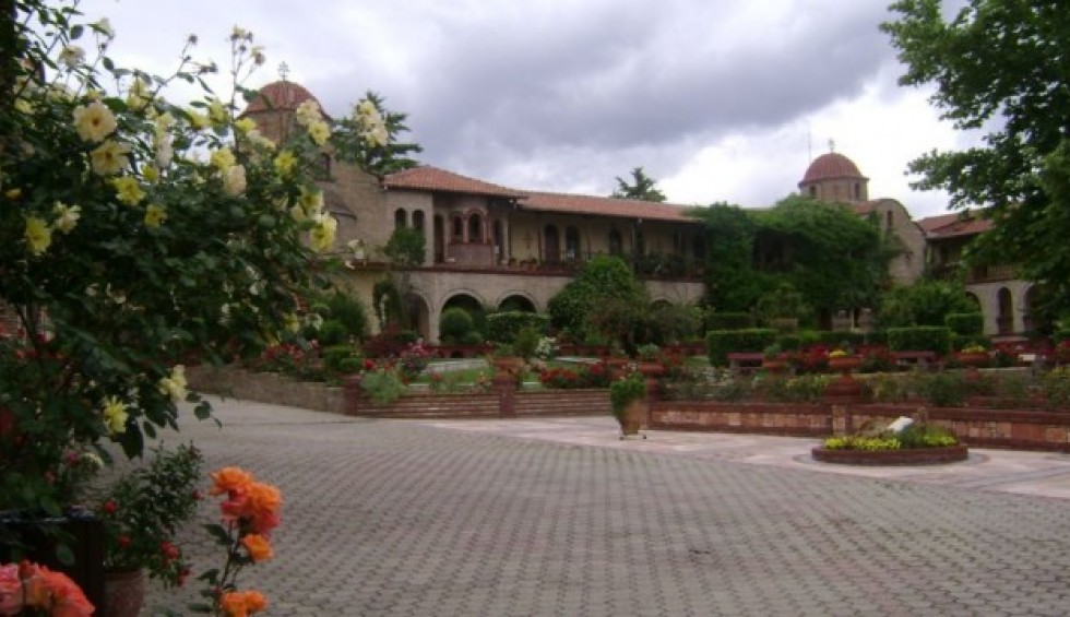 A generic square placeholder image with rounded corners in a figure.