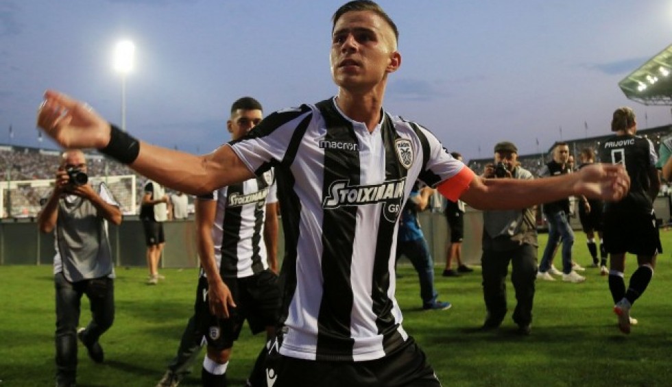 A generic square placeholder image with rounded corners in a figure.