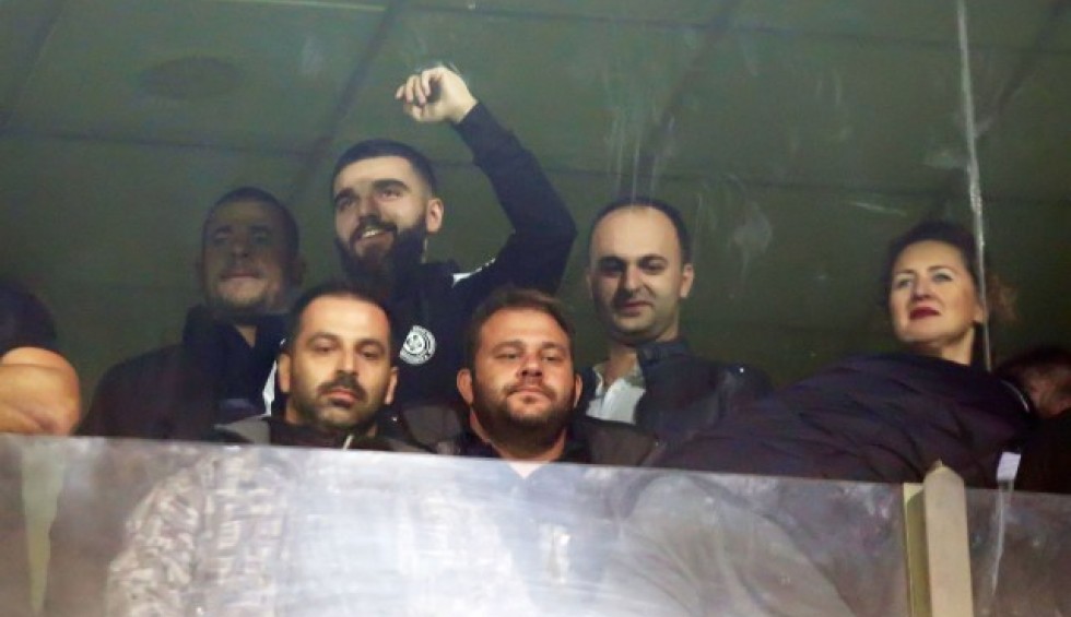 A generic square placeholder image with rounded corners in a figure.